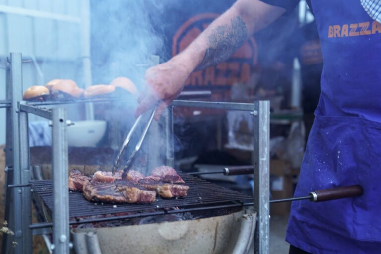 Steak cooking over open flame